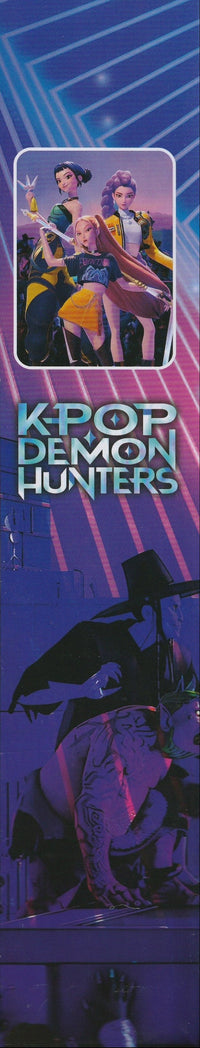 Thumbnail for Side panel of the K-Pop Demon Hunters doll box featuring Rumi, Mira, and Zoey illustrated in colorful anime artwork on a blue-purple futuristic background with the series logo.