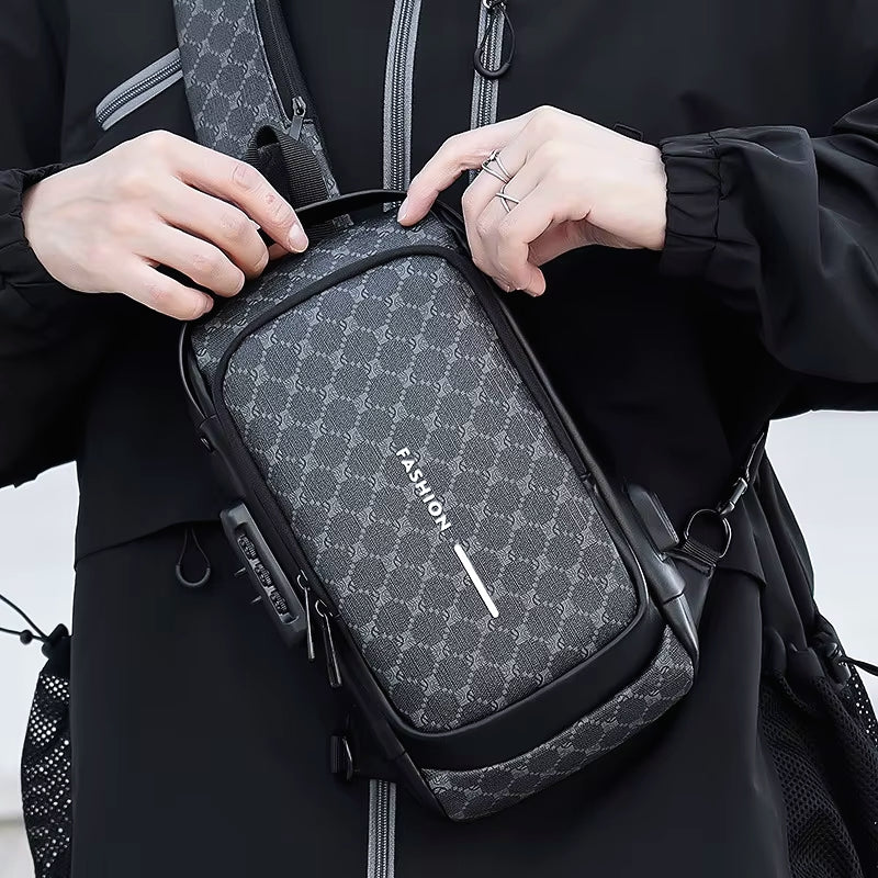 Gray patterned men's anti-theft crossbody chest bag worn as a sling bag for travel and daily use