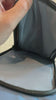 Video showing the spacious interior compartment of a men's crossbody chest bag with durable fabric lining and zipper closure