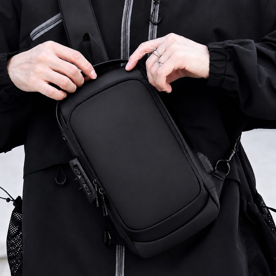 Man wearing an anti-theft crossbody chest bag