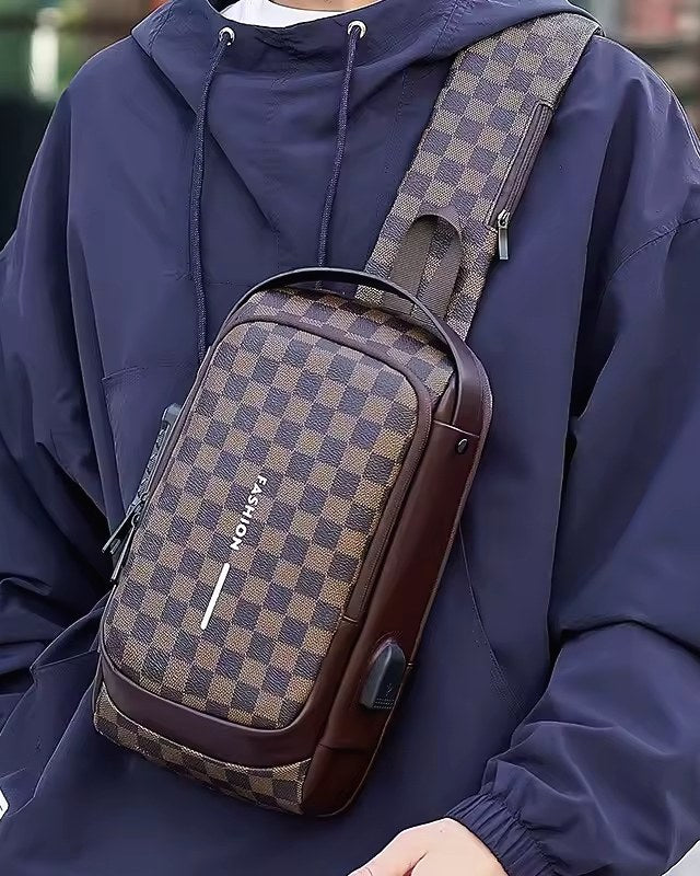 Man wearing a black and brown shoulder bag